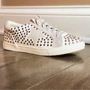 Studded white sneakers